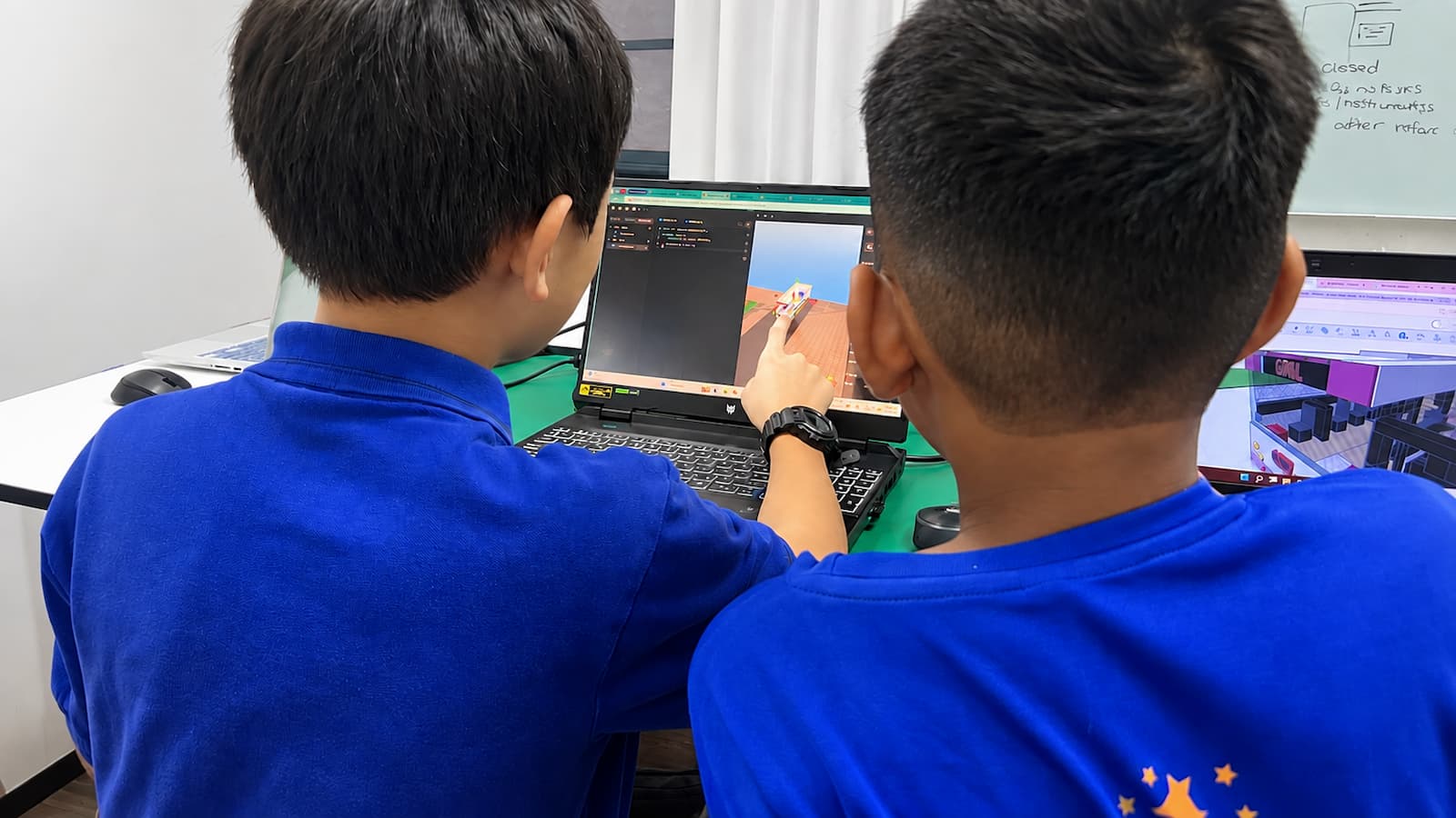 Students in the 21st Mind Coding program